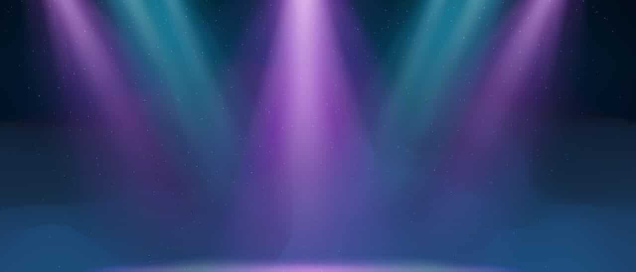 Stock image of blue and purple lights on a stage